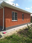 Ведутся работы по нанесению декоративной штукатурки - мраморная крошка