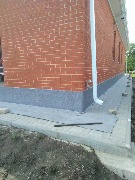 Ведутся работы по нанесению декоративной штукатурки - мраморная крошка